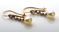 Lot 1085 - A pair of cultured pearl and diamond earrings,...