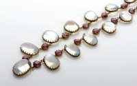 Lot 1093 - A moonstone and tourmaline necklace, c.1900,...