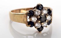 Lot 1097 - A sapphire cluster ring, set with seven...