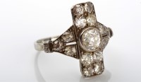 Lot 1112 - A diamond dress ring, c.1915, the central old...