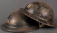 Lot 1131 - A British WWII Police helmet, stamp dated...