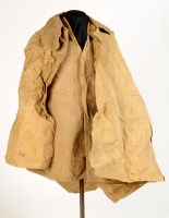 Lot 1160 - † A waterproof trench cape; together with a...