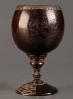 Lot 1185 - † A coconut cup, probably 18th Century, the...