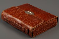 Lot 1190 - † An early 20th Century lady's crocodile skin...