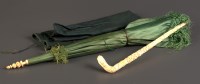 Lot 1191 - † A Chinese carved ivory handled parasol, the...