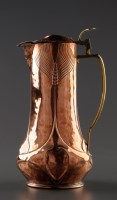 Lot 1199 - An Arts & Crafts copper jug, with hinged lid...