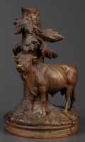 Lot 1204 - A good quality Black Forest carving of a bull,...