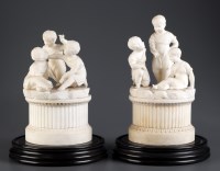 Lot 1205 - † A pair of 19th Century carved alabaster...