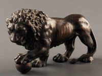 Lot 1212 - A 19th Century bronze Medici lion, with left...