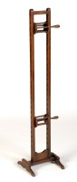 Lot 1218 - † A 19th Century wool winder on splay legs, 41...