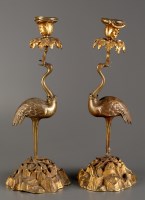 Lot 1220 - † A pair of Victorian gilt brass candlesticks,...