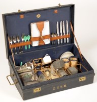 Lot 1230 - † An early 20th Century picnic set, retailed...