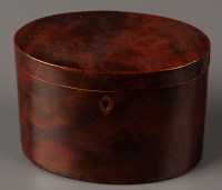 Lot 1236 - A George III oval-shaped mahogany tea caddy,...