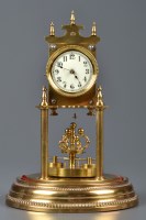 Lot 1288 - A brass torsion clock, probably by W. Wurth &...