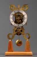 Lot 1307 - A brass skeleton clock, with silvered arabic...