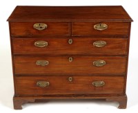 Lot 1321 - A late Georgian mahogany chest of two short...