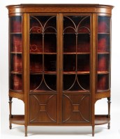 Lot 1326 - An Edwardian inlaid mahogany breakfront...