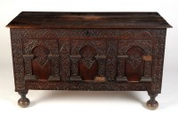 Lot 1338 - † A 17th Century carved oak coffer with...