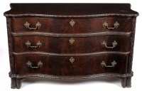 Lot 1357 - † A 19th Century carved mahogany serpentine...