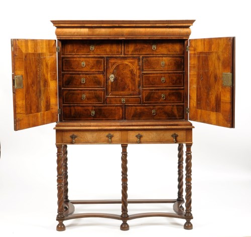 Lot 1371 - † An early 18th Century walnut cabinet, the...