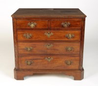 Lot 1397 - † A late Georgian mahogany chest of two short...