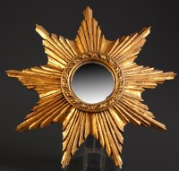 Lot 1401 - † An 18th Century giltwood sunburst pattern...