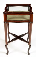 Lot 1407 - An Edwardian mahogany square-shaped bijouterie...