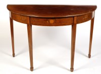 Lot 1410 - A late Georgian mahogany semi-circular side...