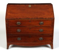 Lot 1411 - A late Georgian mahogany bureau, the...