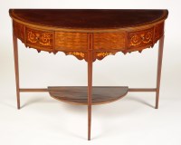 Lot 1413 - An Edwardian mahogany semi circular two-tier...