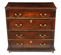 Lot 1418 - An early 18th Century oak chest of four long...