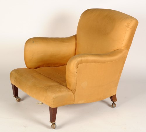 Lot 1427 - † An Edwardian easy chair, by Howard & Sons...