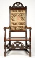 Lot 1448 - A Carolean oak high-back open armchair,...