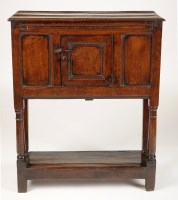 Lot 1449 - An unusual early 18th Century oak cupboard,...