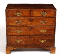 Lot 1479 - A Georgian oak chest of two short and three...