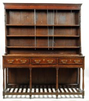 Lot 1481 - An early 18th Century oak dresser, with...