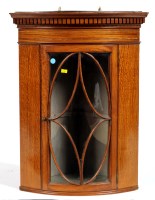 Lot 1487 - An Edwardian satinwood hanging corner cabinet...