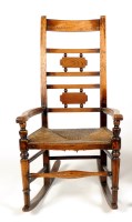 Lot 1489 - An early 19th Century Provincial ladder-back...