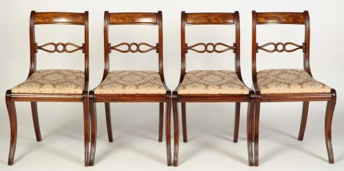 Lot 1498 - A set of four Regency mahogany dining chairs...