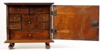 Lot 1500 - A late 17th Century oak and walnut spice box...