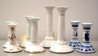 Lot 1551 - Four pairs of porcelain candlesticks, various...