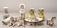 Lot 1553 - A small Continental porcelain figure of a...