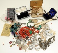 Lot 1565 - A bag of costume jewellery; an ivory glove...