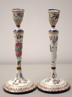 Lot 1569 - A pair of 19th Century porcelain candlesticks,...