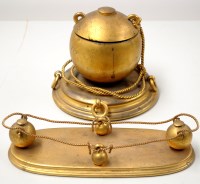 Lot 1574 - A 19th Century gilt-metal buoy pattern inkwell,...