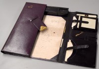 Lot 1584 - A fine quality purple leather correspondence...