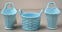 Lot 1592 - A pair of Sowerbys turquoise glass basket...