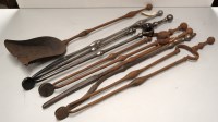 Lot 1613 - A quantity of steel fire implements,...