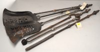 Lot 1615 - A set of four 19th Century fireside implements,...