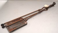 Lot 1617 - Two steel fireside implements, comprising: a...